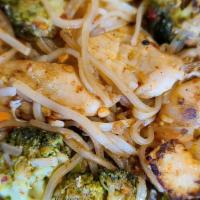 Vegetarian Pad Thai · Stir-fried thin rice noodles with tofu, bean sprouts, scallion and mix vegetables topped wit...