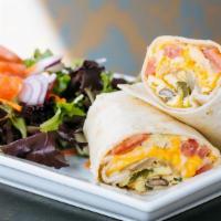 Veggie Breakast Wrap · scrambled eggs, cheddar jack, caramelized onions, roasted peppers, green peppers, chopped to...