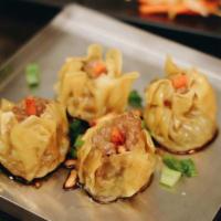 Khanom Jeeb (6 Pcs) · Pork thai style dumplings. Steamed or fried.