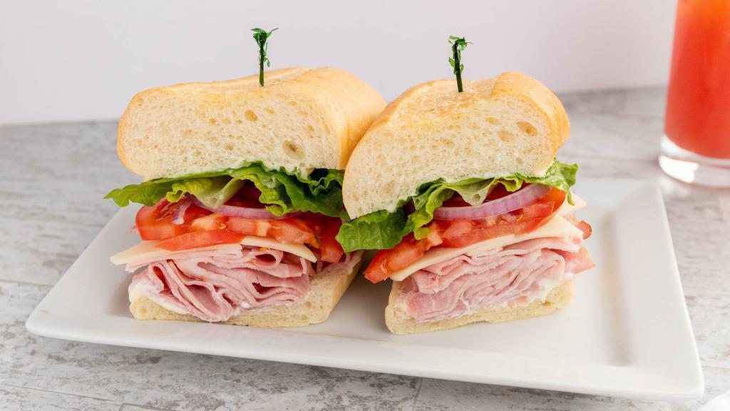 Ham And Cheese · Black Forest Ham and Swiss cheese with lettuce, tomato, onion and mayo.