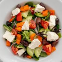 Greek · Greens with cucumbers, tomatoes, peppers, onion, romaine, Kalamata olives and feta cheese wi...