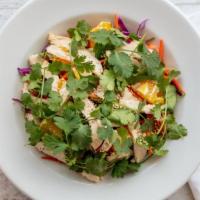 Asian Chicken Salad · Greens with cabbage, chicken, carrots, oranges, cherry tomatoes and cilantro with toasted se...