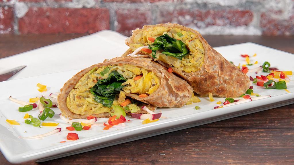 Rolex · Rolled stuffed chapatti. Eggs, salmon, chicken, beef, or mushroom (vegetarian) with cabbage, tomatoes, onions, bell peppers, carrots, spinach.