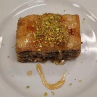 Bucklawa · Layers of homemake thin pastry with walnuts, almonds, pistachios, spiced with cinnamon and c...