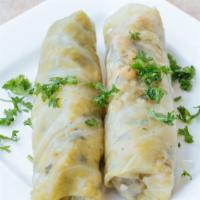 Stuffed Cabbage (2 Pieces) · Cabbage stuffed with rice and ground beef.