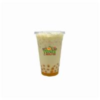 Pina Colada Bubble Tea · Coconut and pineapple milk tea with passionfruit boba, and coconut shreds. Are you ready for...