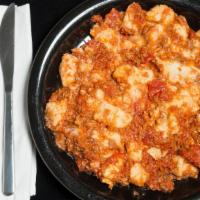 Gnocchi Dipatate Bolognese (1/2 Order) · Homemade potato gnocchi with our famous meat sauce.