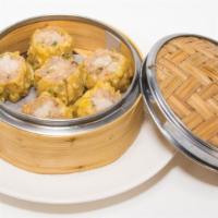 Shao Mai · Steamed egg flour dumplings stuffed with ground pork, shrimp and vegetables.