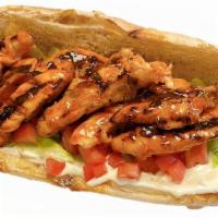 Buffalo Chicken Sub · Choice chicken tossed in buffalo sauce, lettuce, tomato and blue cheese dressing