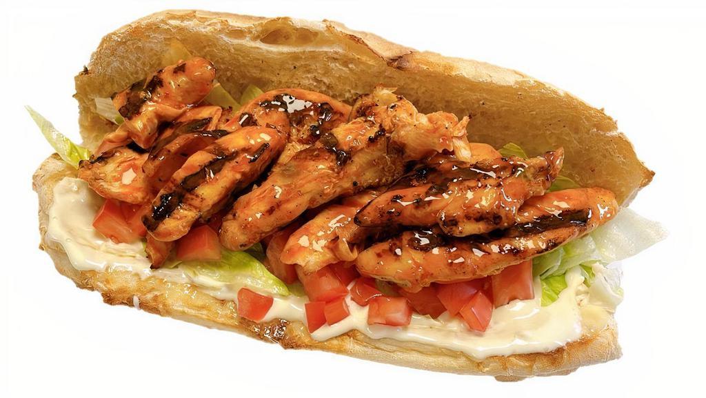 Buffalo Chicken Sub · Choice chicken tossed in buffalo sauce, lettuce, tomato and blue cheese dressing