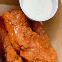 Buffalo Tenders · 4 hand breaded chicken tenders tossed in Buffalo sauce served with blue cheese dip