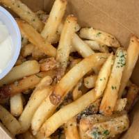 Truffle Fries · Our original fries tossed in grated parmesan and parsley served with a side of truffle mayo.