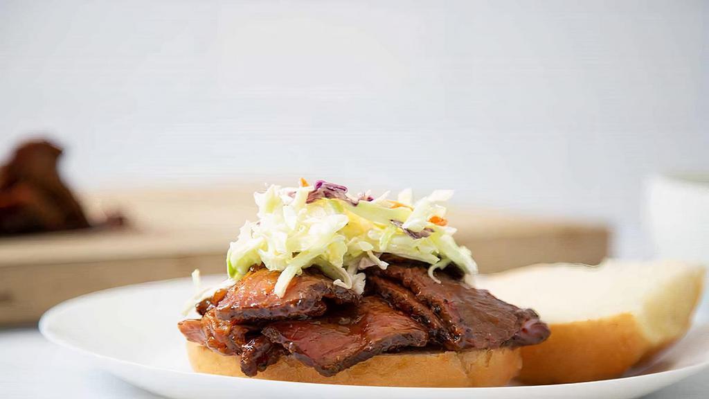 Open-Faced Brisket · Served with gravy on top & cole's slaw on the side.