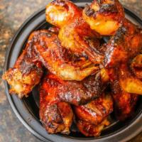 Bbq Chicken Wings (1Lb) · Our homemade honey BBQ sauce is made from scratch and is one of our long standing featured m...