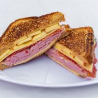 Hot & Toastee Sandwich · Tavern ham, Fuji apple, bacon, Swiss cheese and honey mustard on toasted rustic white.