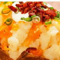 Loaded Baked Potato · Baked potato topped with reduced fat cheddar, scallions, fat free sour cream and lean turkey...