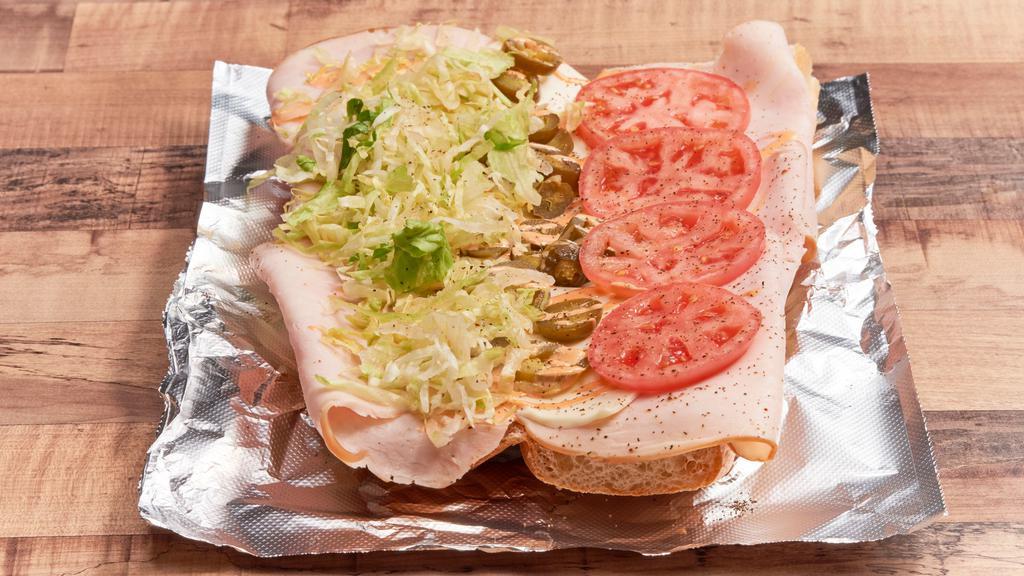 Spicy Turkey · Our classic turkey sub with spicy mayo, jalapenos, lettuce, fresh tomatoes, and American cheese.