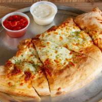 Buffalo Chicken Calzone · Our own dough stuffed with chicken, buffalo sauce and lots of cheese. Baked in the oven