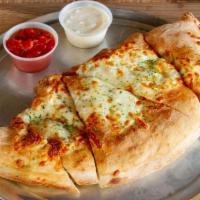 Meat Lover Calzone · Made with pepperoni, sausage, bacon, ham, and hamburger. Feeds 2 people.
