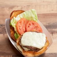 Cheeseburger · 2 Certified Angus Beef patties  or IMPOSSIBLE burger with your choice of cheese, on a toaste...