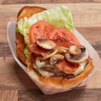 Swiss Burger · 2 Certified Angus Beef patties or IMPOSSIBLE Burger, Swiss Cheese, Grilled Mushrooms, and Ba...