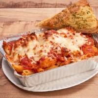Meatball Parm · Penne pasta. Served with our premium pasta sauce, blended meatballs, melted cheese and garli...