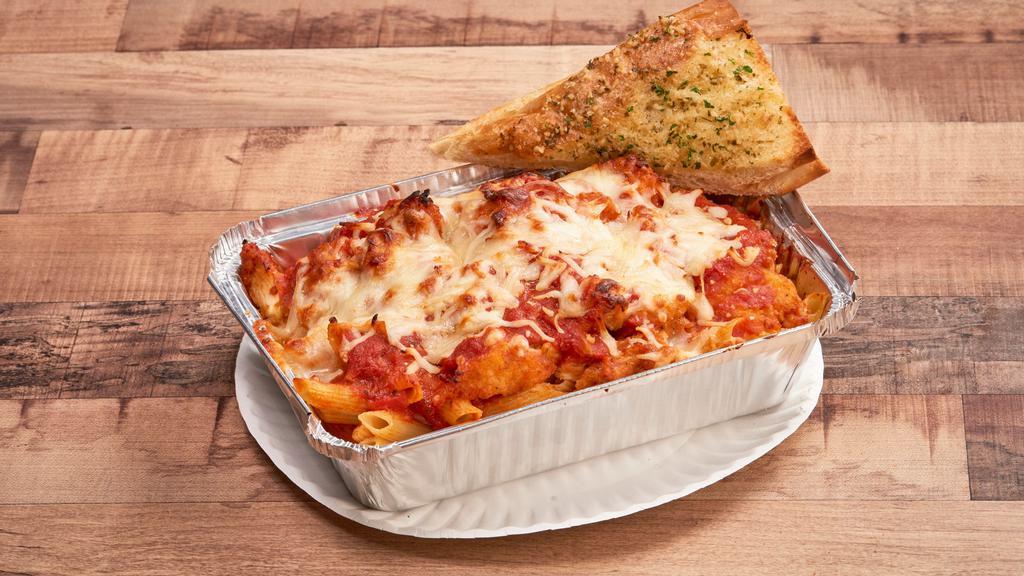 Meatball Parm · Penne pasta. Served with our premium pasta sauce, blended meatballs, melted cheese and garlic bread.