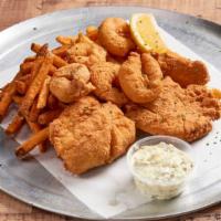 Fish Dinner · Lightly fried Atlantic haddock fillets, served with homemade tartar sauce and lemon wedge.