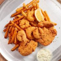 Fried Shrimp Dinner · Lightly battered jumbo shrimp served with lemon, homemade tartar sauce and your choice of 2 ...