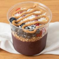 Lake Berry Bowl · A blend of acai, almond milk, and banana. Topped with granola (gf), banana, strawberry, blue...