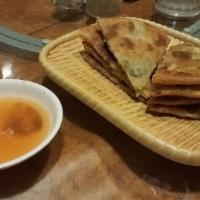 Scallion Pancake · Chinese pizza with dipping sauce.