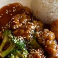 Sesame Chicken · Lightly battered dark meat, quickly sautéed, special brown sauce, toasted sesame seeds.