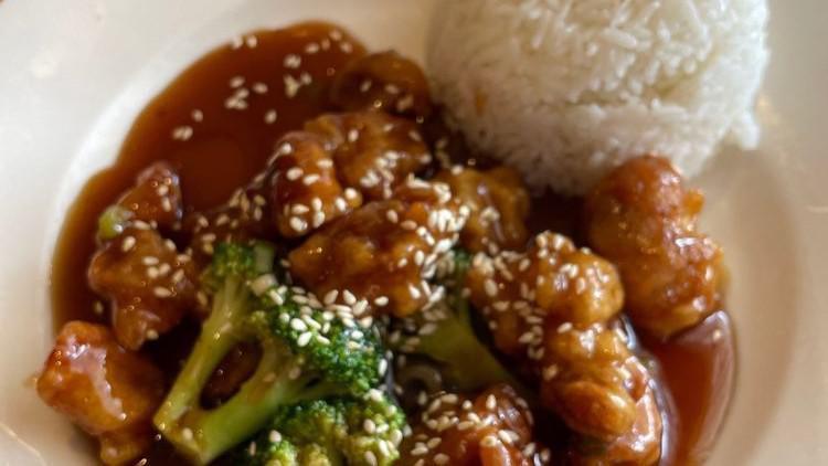 Sesame Chicken · Lightly battered dark meat, quickly sautéed, special brown sauce, toasted sesame seeds.