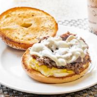 Philly Steak & Egg · Rib Eye Steak, Egg, Provolone Cheese, Sautéed Sweet Onions.
