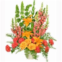 Spiritual Splendor Flower Arrangement · Includes:
Foliage: leather leaf, myrtle tips, sprengeri, hot pink carnations, orange roses, ...