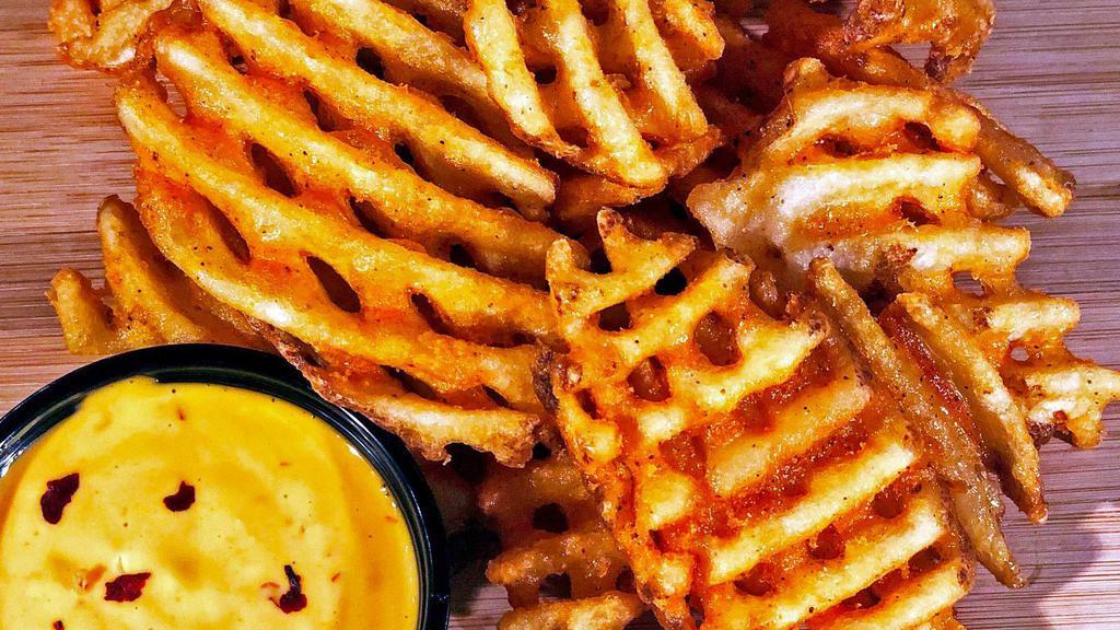 Spicy Waffle Fries · with side of Boom Boom sauce