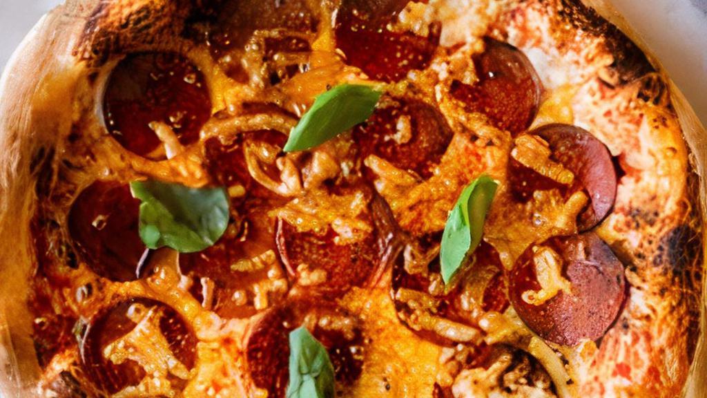 Pepperoni Pizza · Pepperoni, melted mozzarella, fresh basil, garlic, organic tomato sauce, olive oil. NF