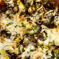 Wild Mushroom & Truffle Pizza · Garlic crema, white truffle oil, wild mushrooms, brussels sprouts. NF