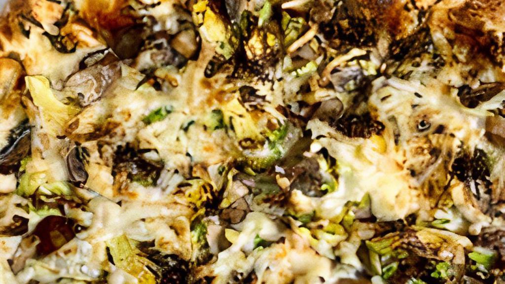 Wild Mushroom & Truffle Pizza · Garlic crema, white truffle oil, wild mushrooms, brussels sprouts. NF