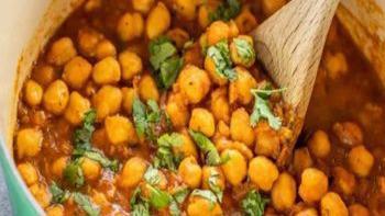 Chana Masala · Vegan, gluten free. Chickpeas cooked in a special blend of traditional spices. Vegan and gluten free.