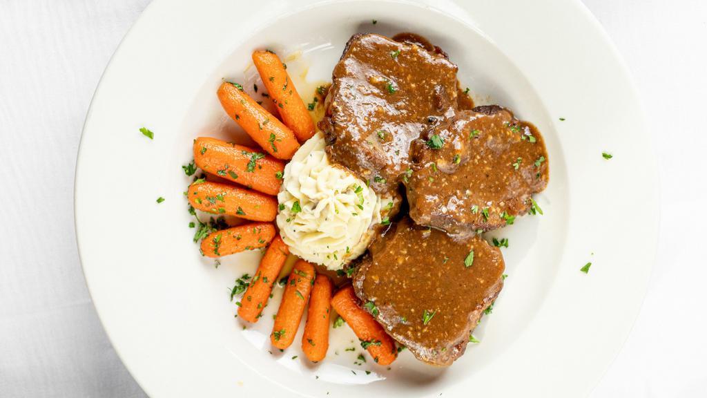 Braised Beef Short Rib · Slow roasted short ribs; served with truffle mashed potatoes & orange glazed baby carrots