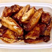 Bourbon Wings (L) · Fried chicken wings in Sticky, sweet Bourbon sauce.