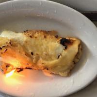 Saganaki Opa! · floured and pan-fried Greek cheese.