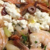 Shrimp Desfina · sautéed with garlic, scallions, tomato, olives and topped with feta served over rice.