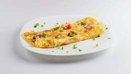 Western Omelette · Eggs onions red pepper, tomatoes, mozzarella and ham.