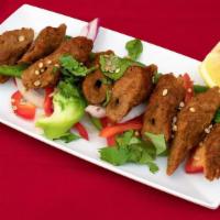 Lamb Seekh Kabab · Ground lamb infused with a combination of herbs and spices gives a distinct appetizing flavo...