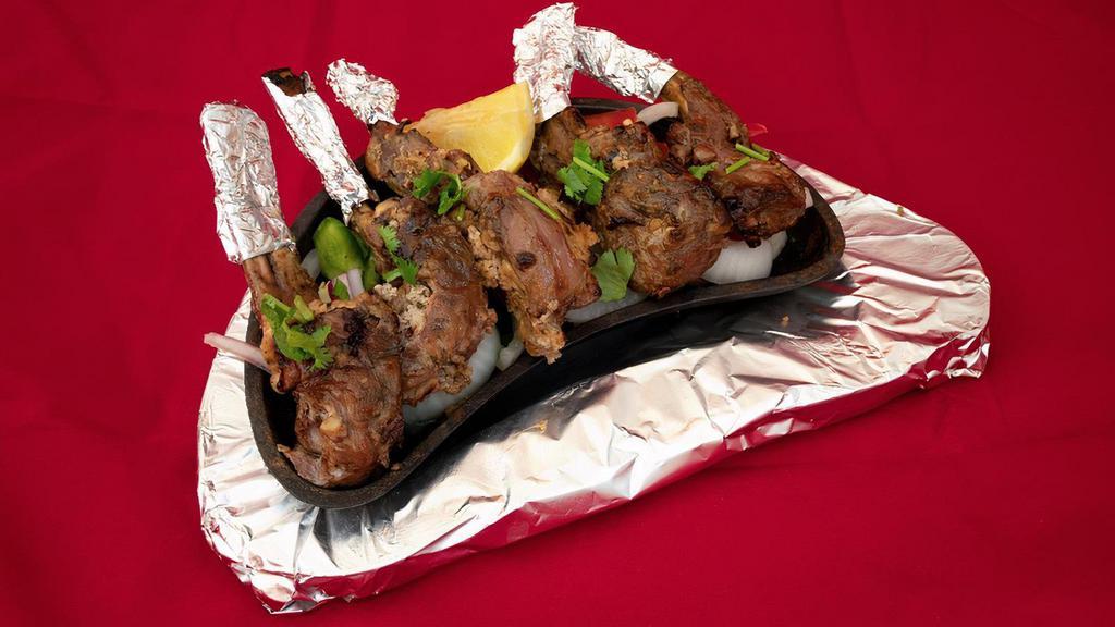 Masala Lamb Chop · Lamb Chops marinated in select herbs & base to tenderize the meat for a delicious result.