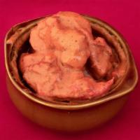 Butter Chicken · This is everyone's favorite! Chicken thigh pieces, grilled in clay oven and then simmered sl...