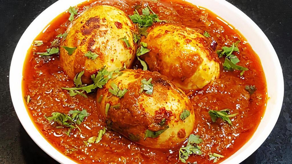 Egg Curry · Classic Indian curry with boiled eggs cooked in tomato and onion gravy.