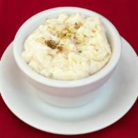 Kheer · Basmati rice are simmered on low heat with milk, khoya, almonds & cardamom mixed with taste ...